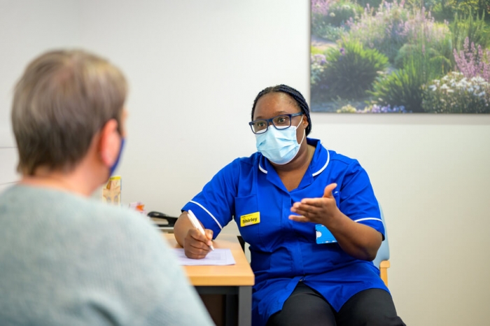 Nurse talking to a patient